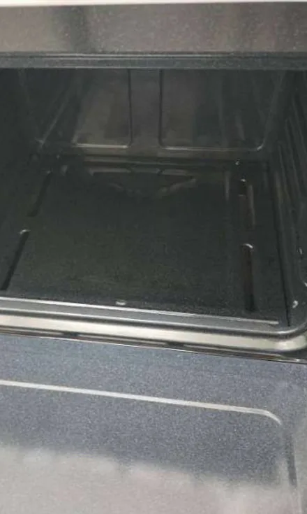The same oven with the inside cleaned